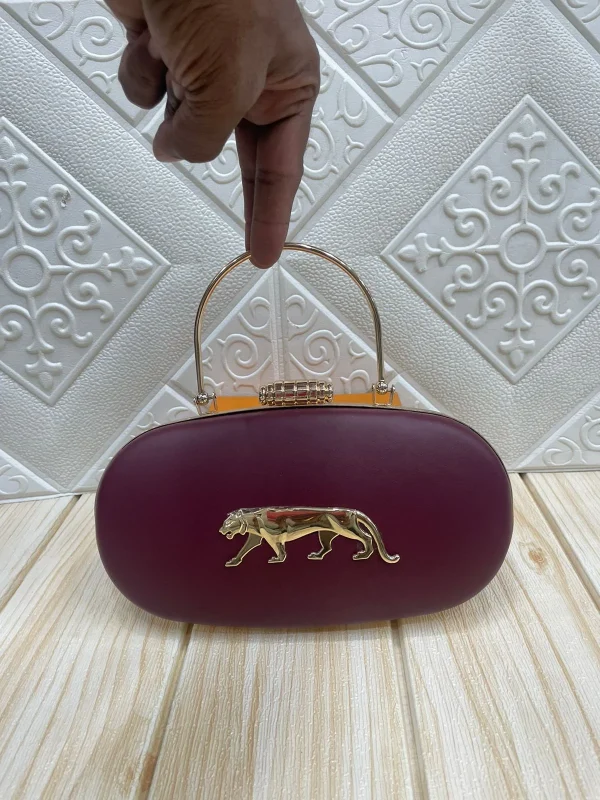 WhatsApp_Image_2026-02-17_at_11.03.27_AM.jpg Sabyasachi Noir Panther Royale Clutch front view