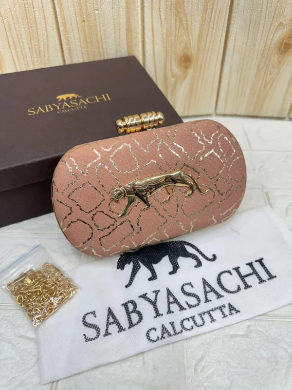 WhatsApp_Image_2026-02-17_at_11.03.37_AM.jpg Sabyasachi Heritage Panther Clutch in Regal Sand Edition