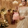 WhatsApp_Image_2026-02-19_at_8.01.26_PM.jpg Luxory Royal Pearl Embroidered Potli Bag