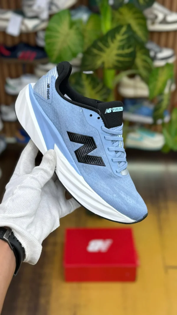 WhatsApp_Image_2026-03-10_at_11.03.38_AM.jpg New Balance FuelCell Rebel v5 Shoes in blue