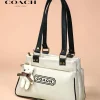 Coach New York Canvas Tote Bag in beige with teddy keychain
