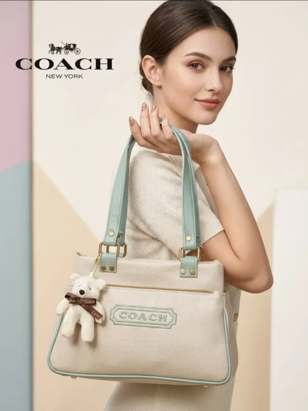 Coach New York Canvas Tote Bag in beige with teddy keychain