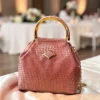 WhatsApp_Image_2026-03-15_at_1.37.03_PM_1.jpg Luxury Croco Textured Potli Bag with Gold Handle - Front View