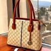 GG Canvas Dual Zipper Tote Bag front view