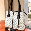 GG Canvas Dual Zipper Tote Bag front view