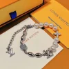 LV Monogram Beaded Bracelet close-up view