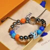 LV Monogram Beaded Bracelet close-up view