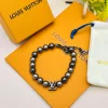LV Monogram Beaded Bracelet close-up view