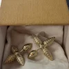 WhatsApp_Image_2026-04-13_at_3.56.22_PM_3.jpg Close-up of LV Louisette Macro Earrings for her