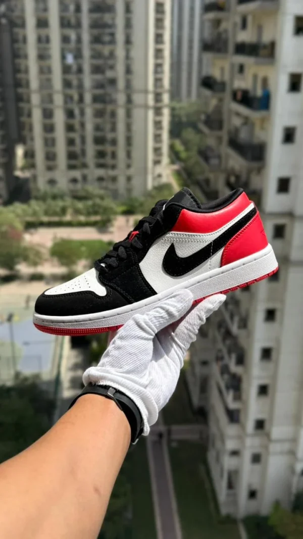 Nike Retro 1 Low Retro Sneakers in black and white