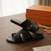 HERMES slip ons for men in black leather