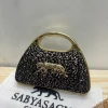WhatsApp_Image_2026-05-15_at_1.24.02_PM_1.jpg Sabyasachi Elegant Leopard Clutch Bag front view