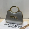 Sabyasachi Leopard Luxe Clutch front view