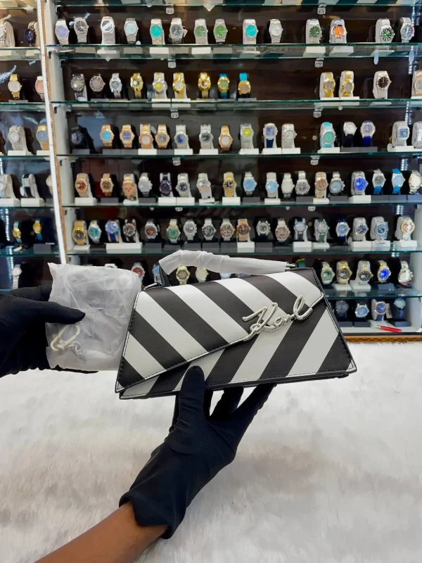 Karl Lagerfeld signature sling bag for girls in white and black
