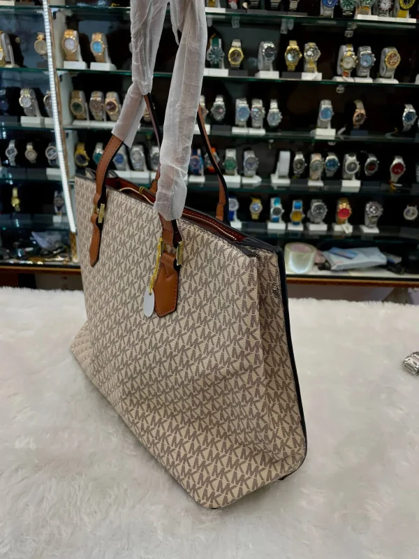 cozPn5l9.jpg Michael Kors MK Handbag for Girls in Brown - Front View