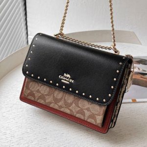photo_2025-11-22_14-00-26_10.jpg Klare Crossbody Bag In Signature Canvas With Rivets