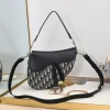 Dior Saddle Bag 25cm in leather and canvas with black D-print