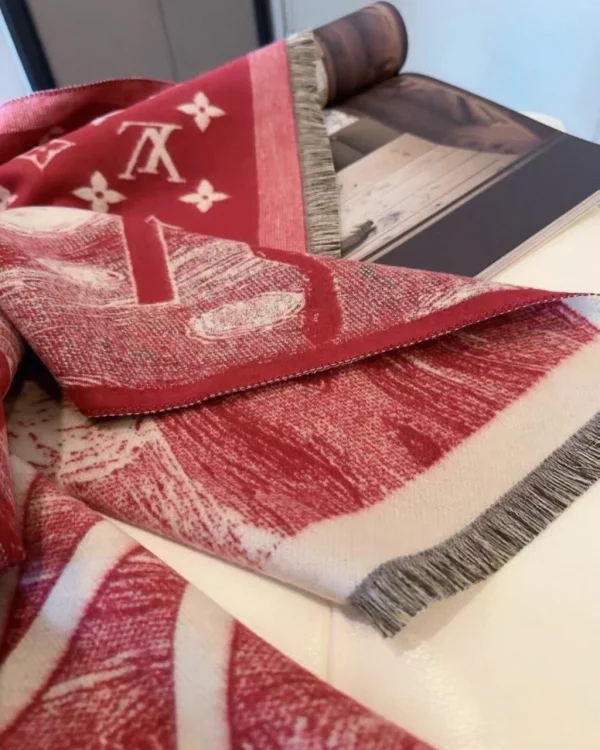 LV INITIAL WINTER REVERSIBLE STOLE in elegant display