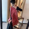 LV INITIAL WINTER REVERSIBLE STOLE in elegant display
