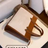 photo_2025-12-10_17-26-32.jpg Coach Classic Two-Tone Tote Bag in stylish design