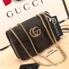 GG Croco Sling Bag in black leather