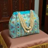 photo_2025-12-15_16-36-35_2.jpg Luxory Traditional Embroidered Potli Bag in vibrant colors