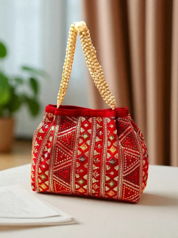 photo_2025-12-15_16-36-35_5.jpg Luxory Traditional Embroidered Potli Bag in vibrant colors
