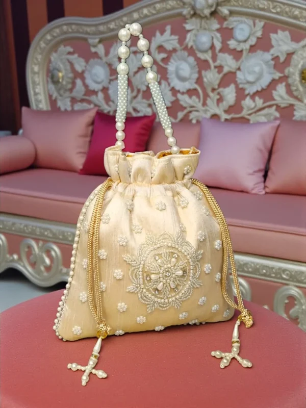 photo_2025-12-15_16-37-22_4.jpg Luxory Pearl Grace Embroidered Potli Bag front view