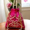 photo_2025-12-15_16-40-36_4.jpg Luxory Royal Pearl Embroidered Potli Bag front view