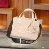 Karl Signature Top-Handle Bag in black