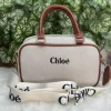 photo_2025-12-20_14-24-26.jpg Chloé Canvas Sling Bag in beige with broad belt