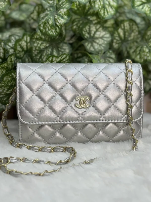 Chanel Quilted Sling Bag in black leather