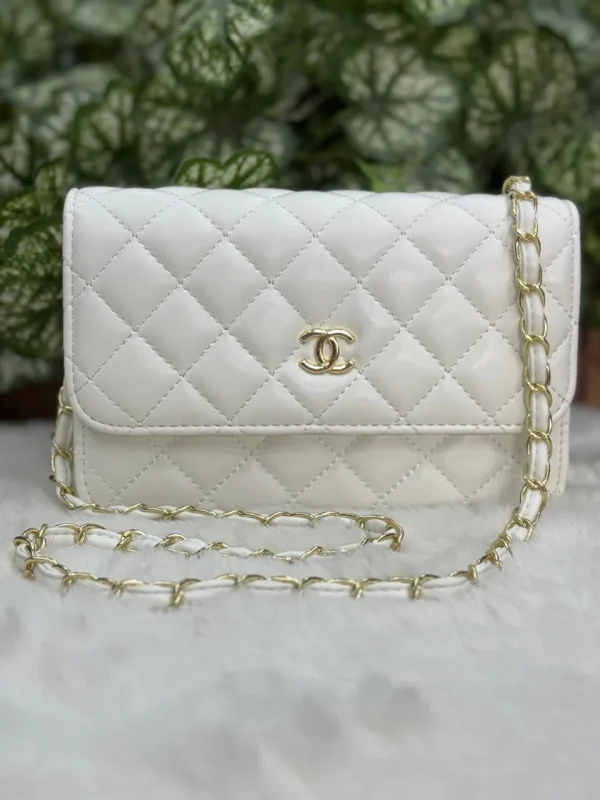 Chanel Quilted Sling Bag in black leather