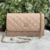 Chanel Quilted Sling Bag in black leather