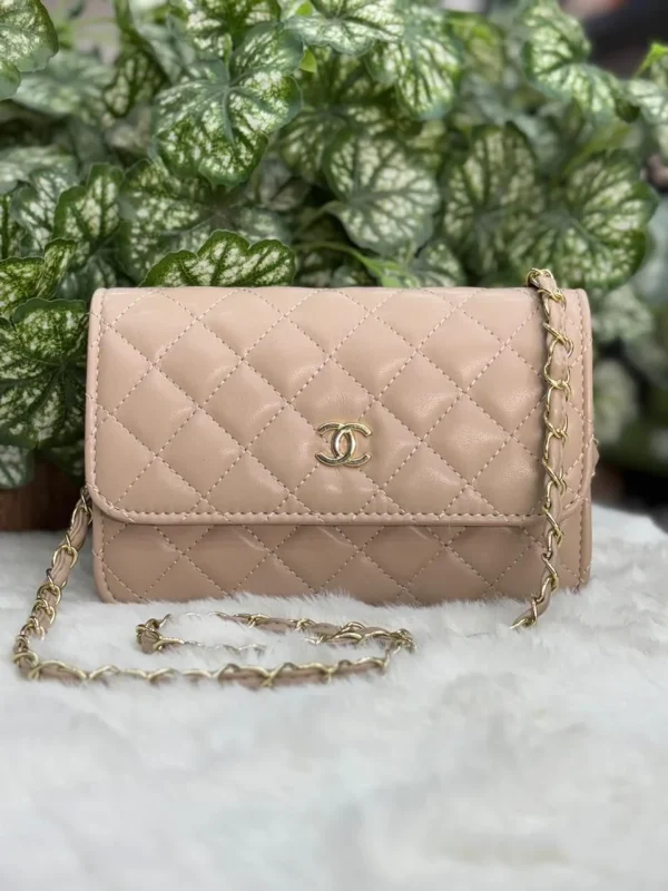 Chanel Quilted Sling Bag in black leather
