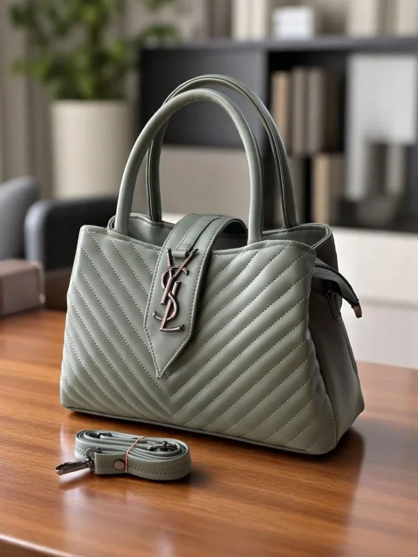 photo_2025-12-22_17-01-39_014a3672-c692-4c66-9503-bff7db1e086e.jpg Yves Saint Laurent Structured Handbag in black leather
