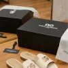 DOLCE & GABBANA DG-logo leather slides in black