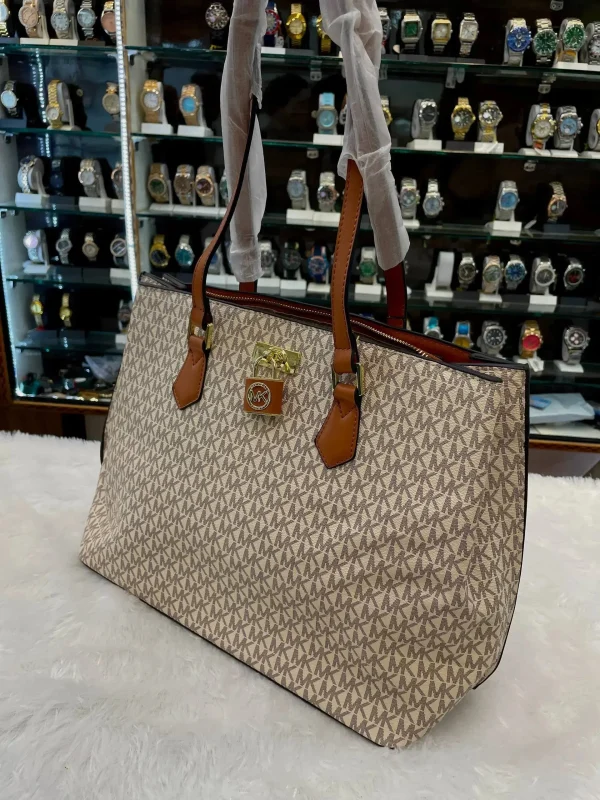 vrzeEiMV.jpg Michael Kors MK Handbag for Girls in Brown - Front View