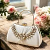 Elegant stone-studded bridal clutch in gold