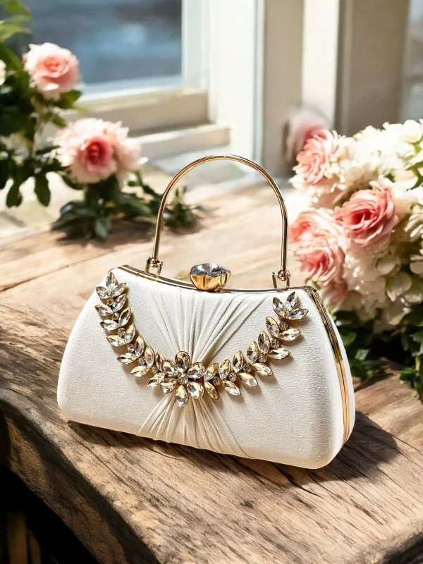 Elegant stone-studded bridal clutch in gold