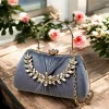 Elegant stone-studded bridal clutch in gold